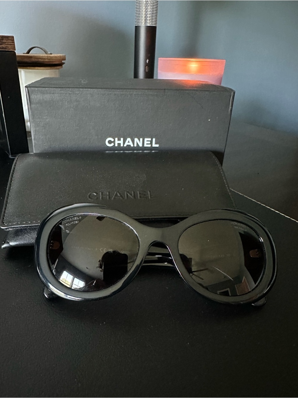 CHANEL Black Oval Sunglasses with Gold Logo Accent - Picture 2 of 6